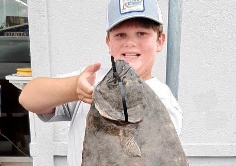 Boy with flounder 2a